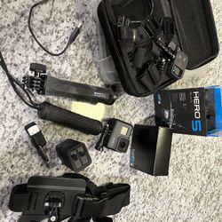 Go Pro Hero 5 With Accessories Pictured - Used A Couple Of Times 