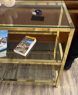 Glass and gold large entryway console with shelves (**2 matching circular glass and gold side tables available as well, being sold separately)