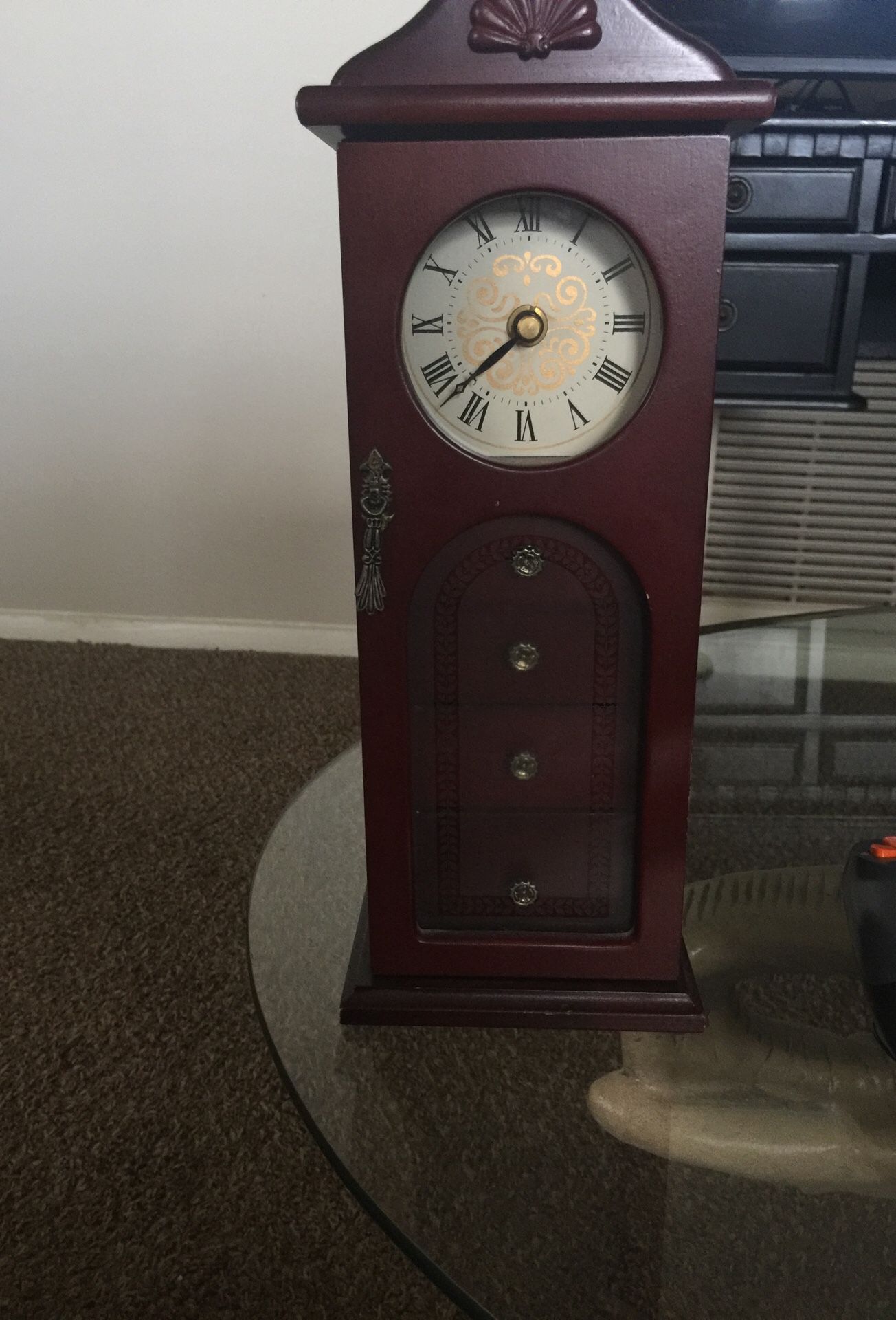 Antique jewelry stand with clock