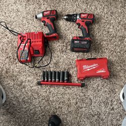 Milwauke Drill And driver With Charger, Drill Bits And Sockets