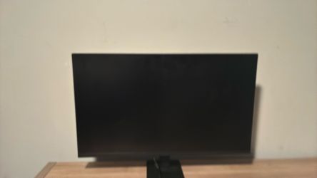 The brand is a LG monitor the size is pretty good for a monitor