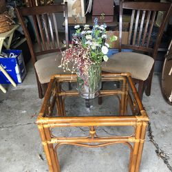 Wicker Table With clear  Glassand2 Chairs I Will Include Flower Vaze.