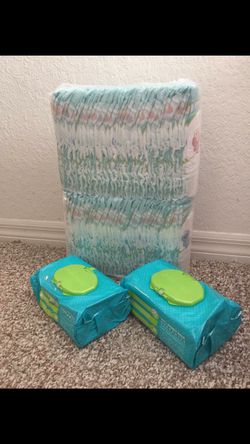 Pampers size 4 ( 86 )diapers with 2 pack of wipes