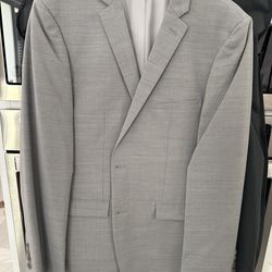 Silver men’s suit in excellent condition