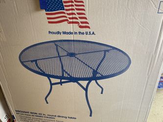 Iron backyard table. Brand new in box.