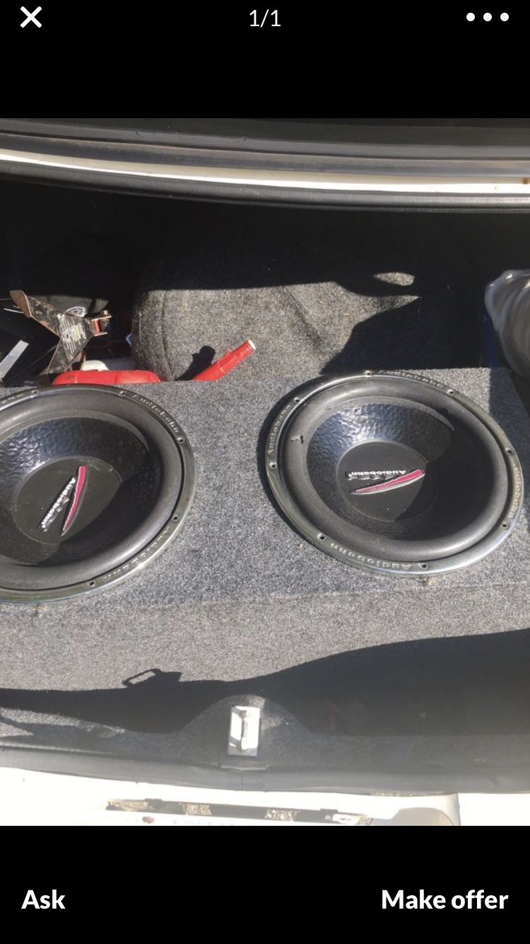 2-12 inch Audiobahn subs in a sealed box