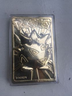 Gold Togepi Pokémon Trading Card.