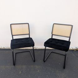 set of two chairs with cane back