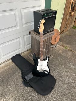 Fender Squier guitar package with amp, case and strap all in good condition and working. The guitar will need new strings but functions perfectly as t