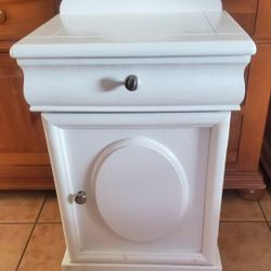 Wood storage cabinet with drawer and shelves