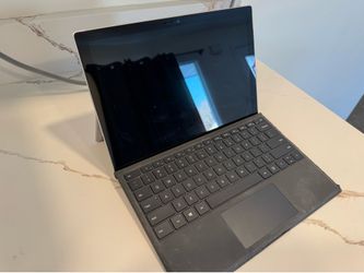 Surface Pro 4 with charger and type cover