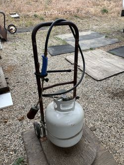 Propane torch soften asphalt