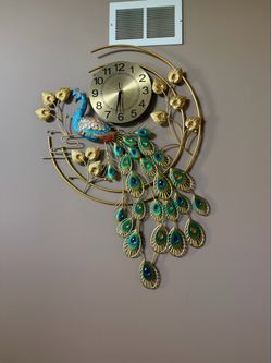 Peacock wall clock