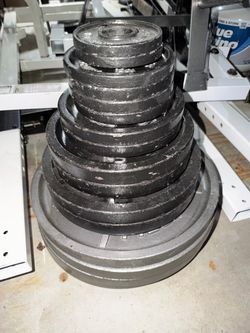 345lbs Olympic Weights plus 45lb bar plus Rack Bench Weight Tree and pulldown machine