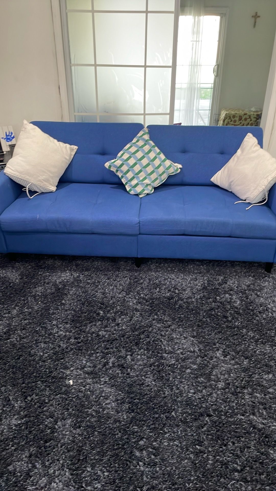 Blue sofa bed in good condition.