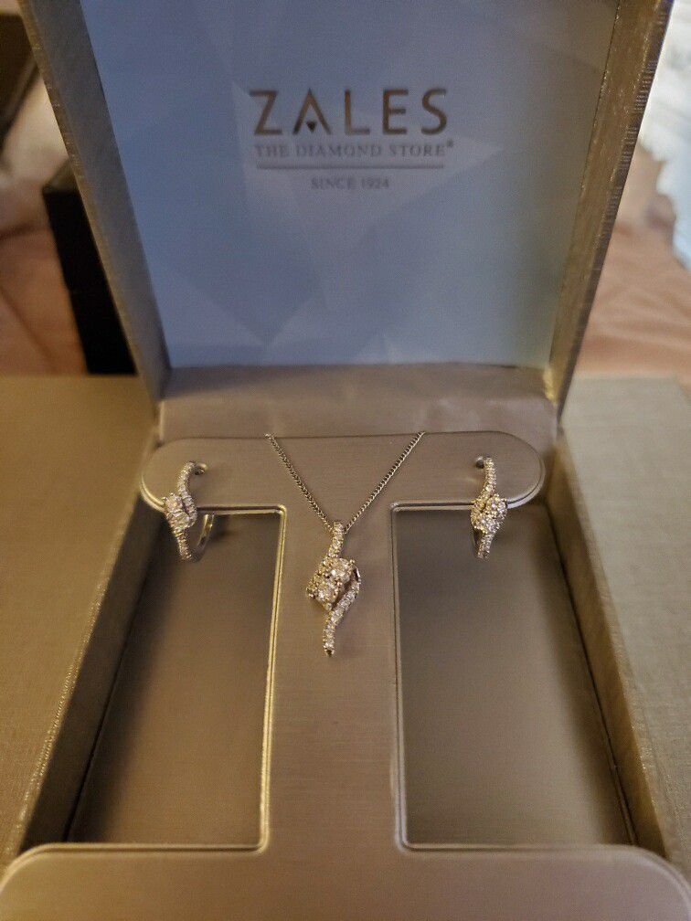Diamond necklace and matching earrings from Zales with box