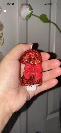 Red glittery candle with bow number 2