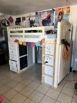 kids’ loft bed with storage drawers and desk underneath