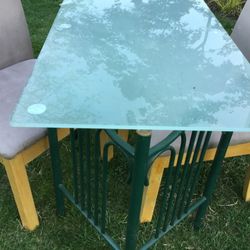 A Beautiful  Glass  Table With  Two Strong  Large Chairs 