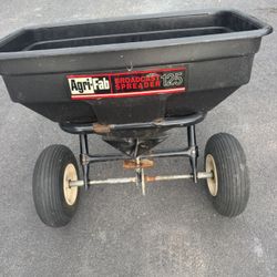 Agri Fab Tow Behind Broadcast Spreader 125lb Capacity. Works Good. Must Pickup