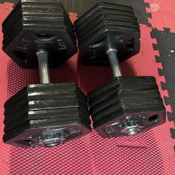 Pair of 55lb iron adjustable dumbbells $110