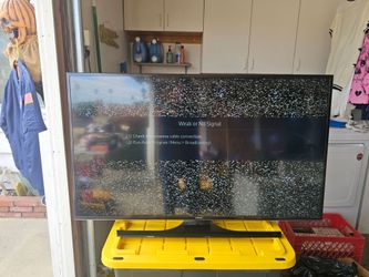 Samsung 50" smart TV with stand and remote. Excellent condition