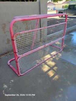 Full size hockey, baseball net. Sports back drop.