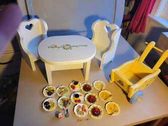 Two chairs, table, wheelbarrow and plates of food for 18 in dolls