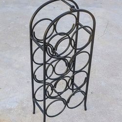 Wine Rack- Metal Arc Wine Holder Holds 8 Bottles- Measurements:  26.5"H x 10.5"W x 5.5"D
  • Wine Accessories, Racks, Wine Racks, Wine Bottle Storage 