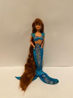 Very collectible vintage ‘95 Barbie Jewel Hair Mermaid Midge doll