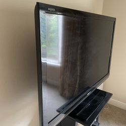 Sharp 60” LCD TV With Stand