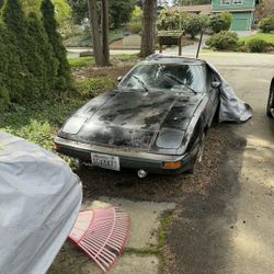 1982 Mazda rx7 black automatic 
1981 Mazda rx7 white 5 speed manual 

We have all sorts of parts for the cars:

13 b turbo rotary engine with 5 speed 