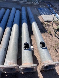 Big metal poles with base