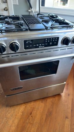 Used and working with blower Jenn-Air slide-in dual-fuel or gas range