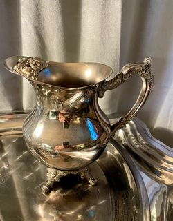 Silver tea pitcher