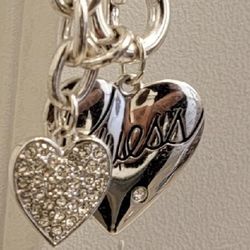 Guess Y2K Vintage Charm Necklace
Front toggle clasp.
Two reversible heart charms..