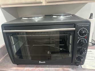 Toaster oven/rotisserie and stove top