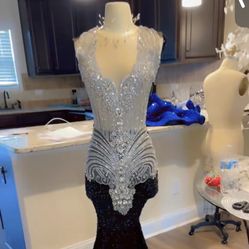 Custom Made Dress. Size: Chest 31”, Waist 24”, and Hip 33”