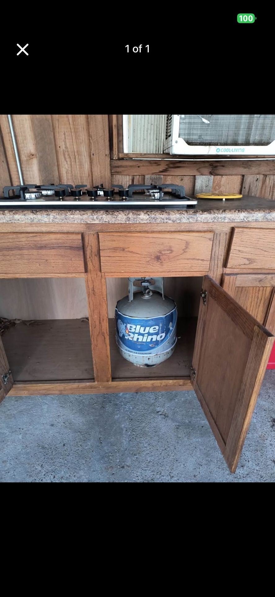 Cabinet with built in propane stove. 5 Burner.