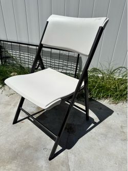 White fold up chairs