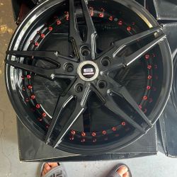 Rim 17x7.5 Black with red rivets, like new . wheel lock is included 