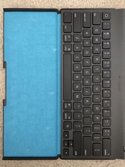 Apple iPad keyboard, Logitech Bluetooth iPad keyboard, video adapters and FM transmitter - $10