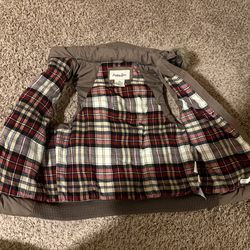 Brown plaid puffer vest. Women’s xs girls XL
