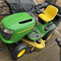 John Deere L120 20HP Vtwin Engine And 48” Deck And 2 Bin Bagger Riding Mower