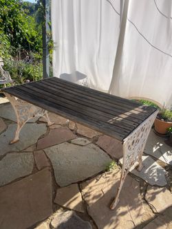 Vintage wrought iron and wood slat table