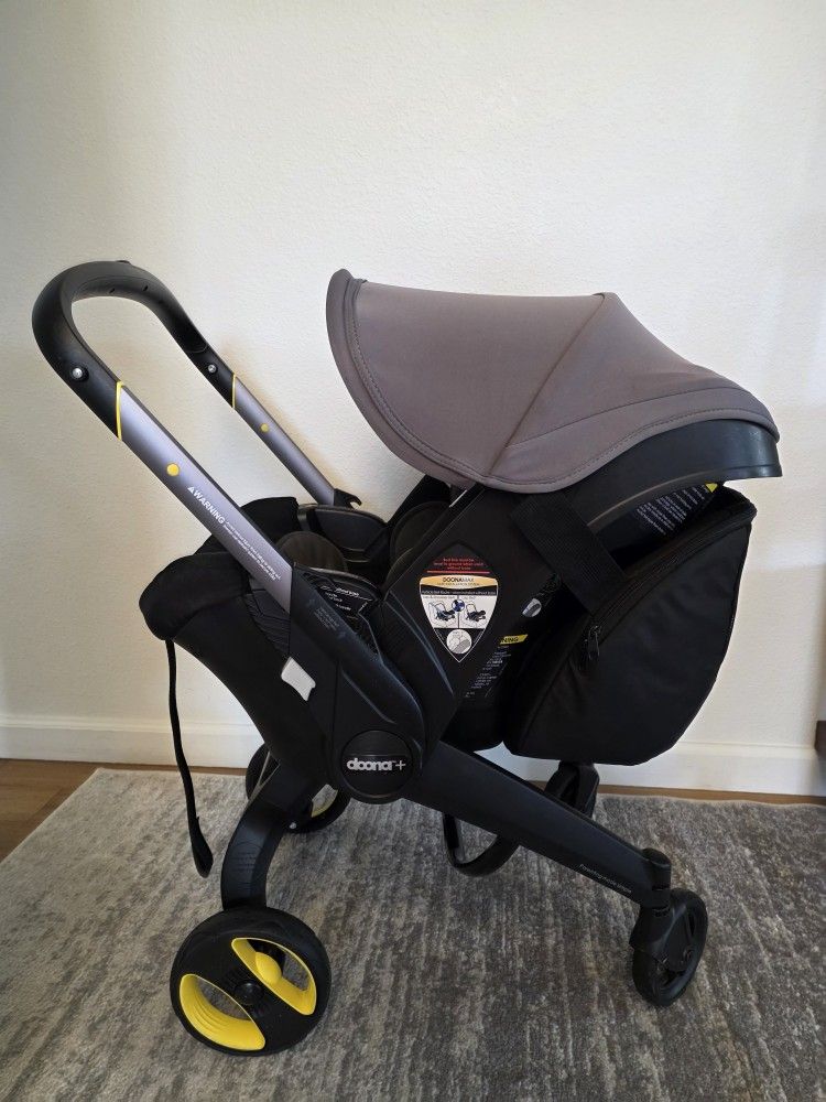 Doona Stroller + Base + Attachable Bag  + Seat Protector – Clean & Smoke-Free - Baby