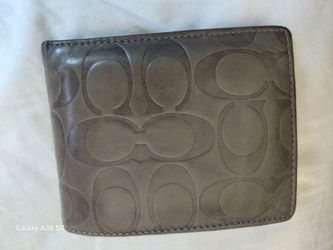 Coach Signature Embossed Leather Bifold Wallet