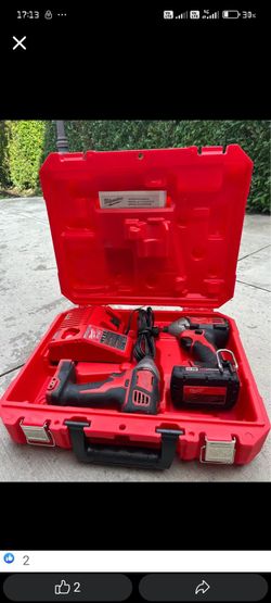 Milwaukee M18 2 Impact Drivers + Battery + Charger & Case $150