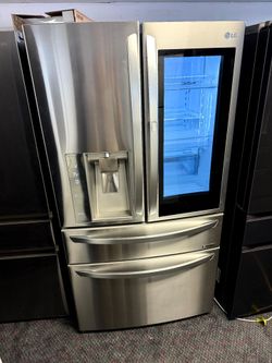 LG stainless steel French door refrigerator and bottom freezer and instaview window