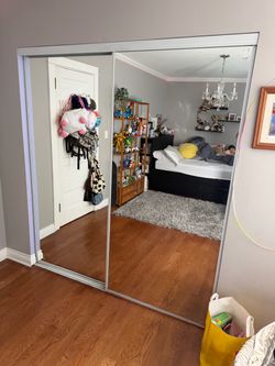 IKEA closet and sliding glass mirrors